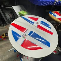 Custom Dominican flag design in the workshop