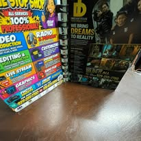 A display of printed promotional materials and service flyers.